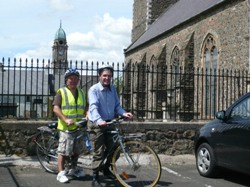 Still in the saddle as they arrive at Lisburn Cathedral!